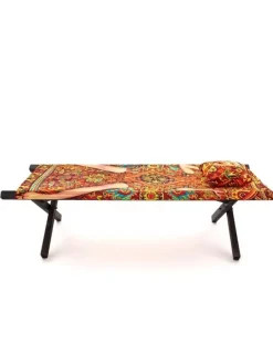 Lady on carpet ligbed - 16620